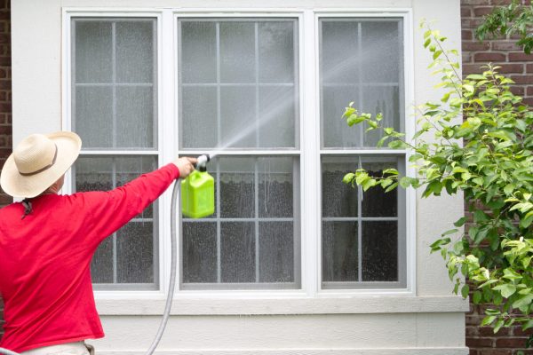Man,Spring,Cleaning,The,Exterior,Of,His,House,Washing,Down Man,Spring,Cleaning,The,Exterior,Of,His,House,Washing,Down